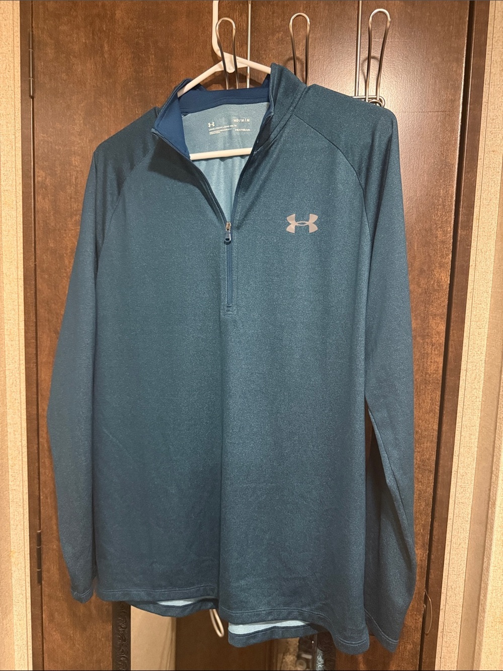 Under Armor HeatGear long sleeve 1/4 zip performance pullover over in dark teal